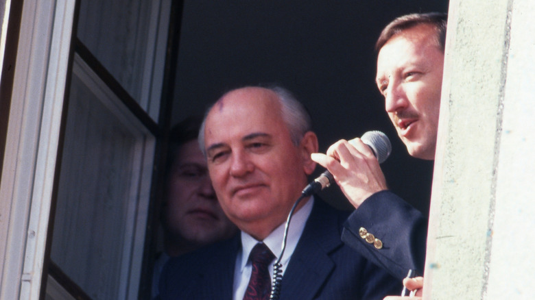 Gorbachev looks out a window in germany in 1992