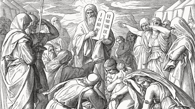Moses displaying the Ten Commandments