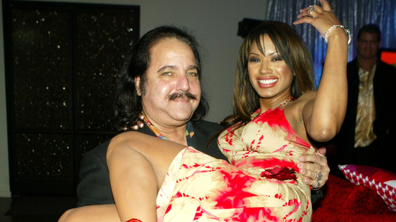 Ron Jeremy and actress posing