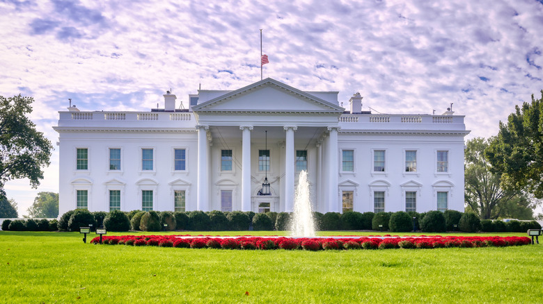 The White House under cloudy blue sky