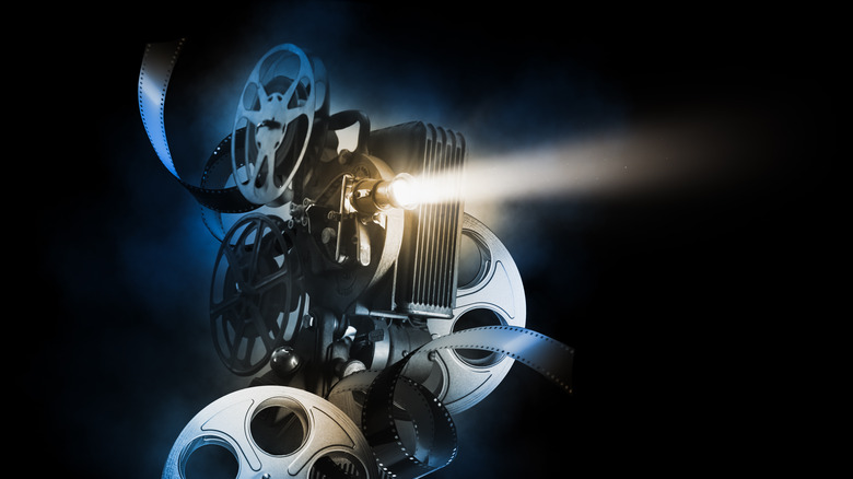 Film projector on black background