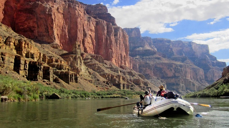 people rafting through canyon on Colorado River