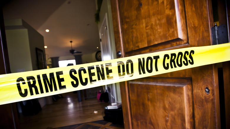 Crime scene taped over front door