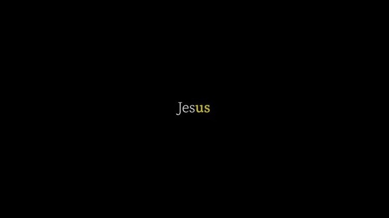 The word "Jesus" on a black background