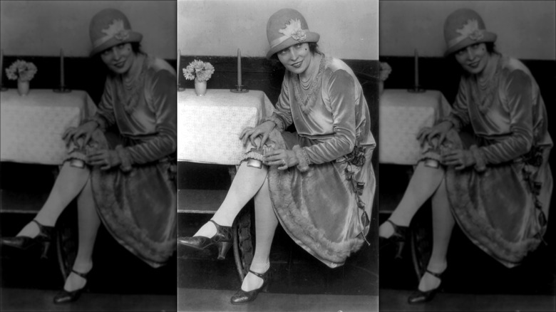 1920s woman flask in leg garter