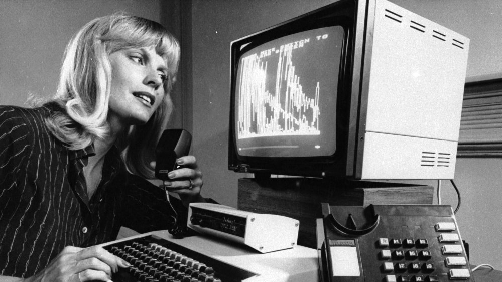 A woman using a computer in 1984