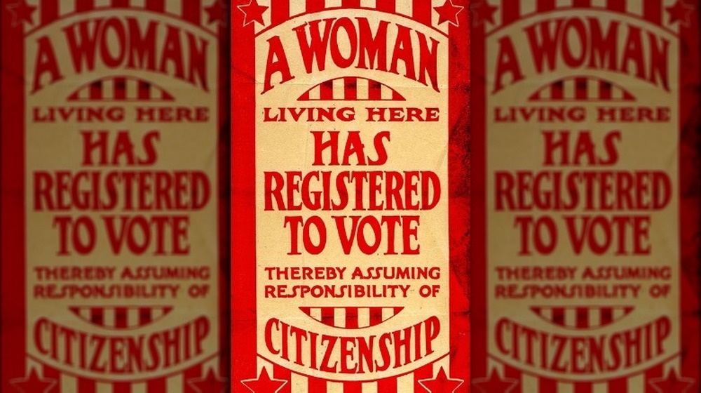"A Woman Living Here Has Registered to Vote" sign