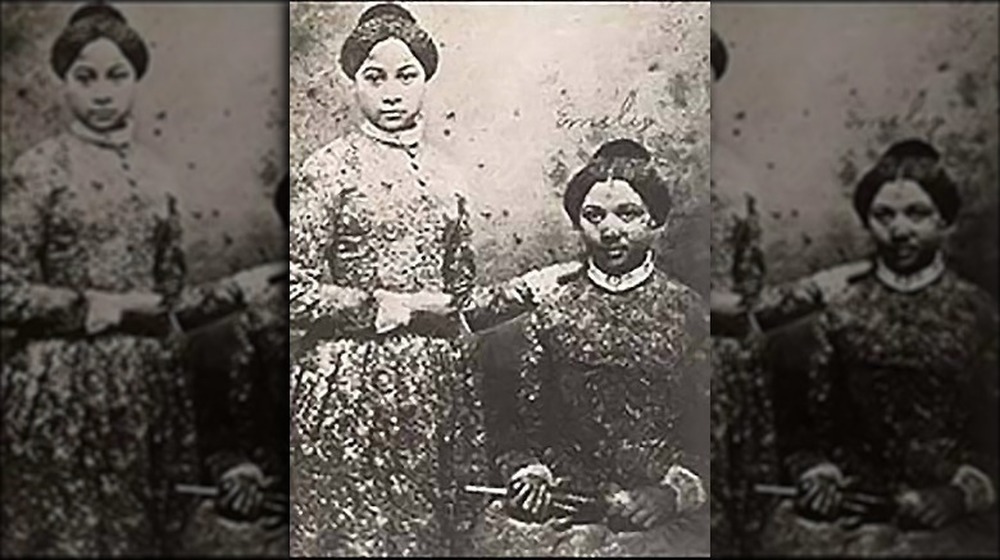 Freed sisters Mary and Emily Edmonson, standing