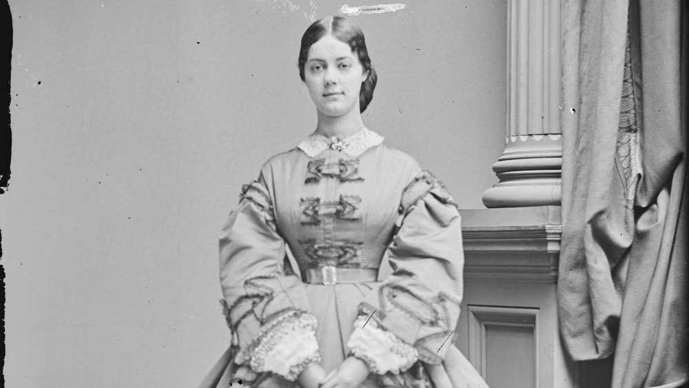 Kate Chase Sprague, standing