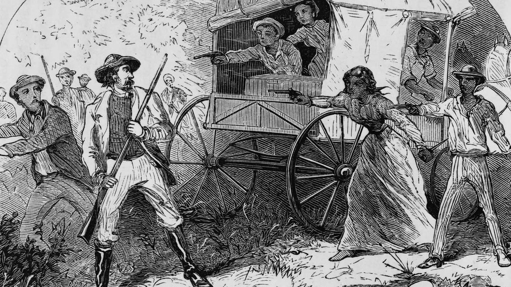 Slaves in a carriage draw guns on white slave hunters 