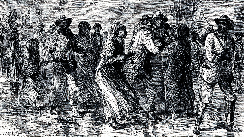 Illustration of slaves walking through the rain