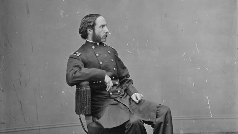 Major Henry R. Rathbone sitting in chair, picture between 1860 and 1865