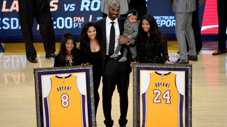 Kobe and his family at his jersey retirement ceremony