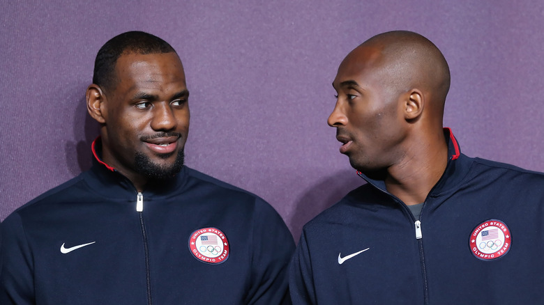 LeBron James and Kobe Bryant looking at each other