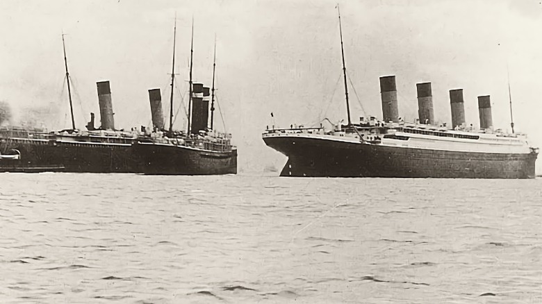 SS New York on the left in harbor with Titanic