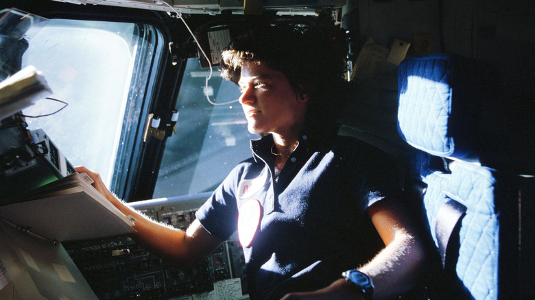 Sally Ride in space shuttle cockpit