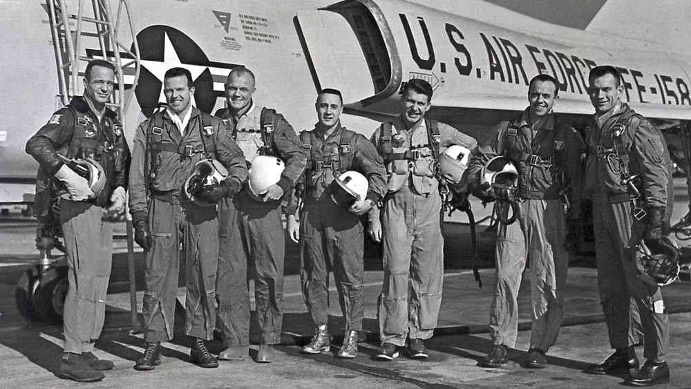 The Mercury Seven in front of an Air Force jet