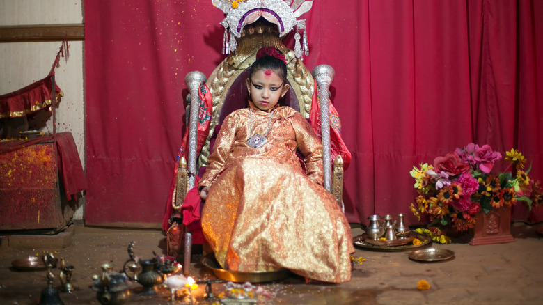 Living Goddess Kumari in her home. Nepali people believe Kumari is incarnation of Hindu goddess Durga