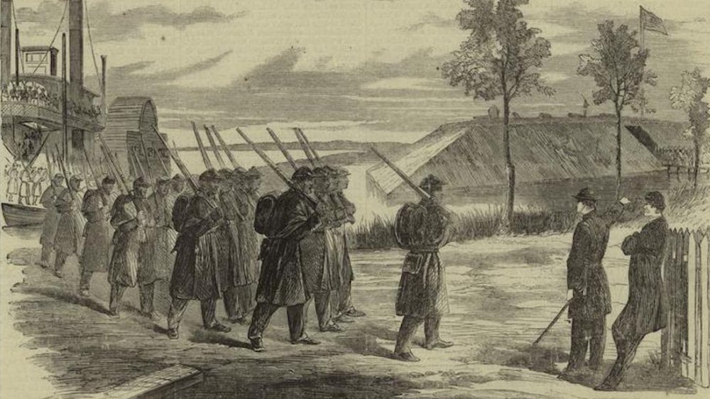 Troops of the Louisiana Native Guard disembarking at Fort Macomb, Louisiana, for guard duty.