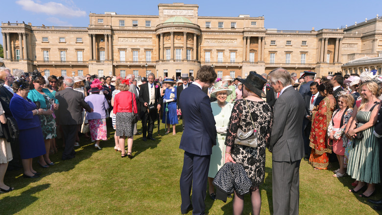 The queen at a garden party at Buckingham Palace
