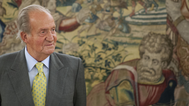 Juan Carlos of Spain looking side smiling