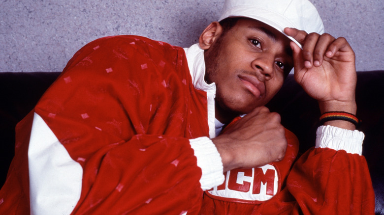 LL Cool J red jacket white hat
