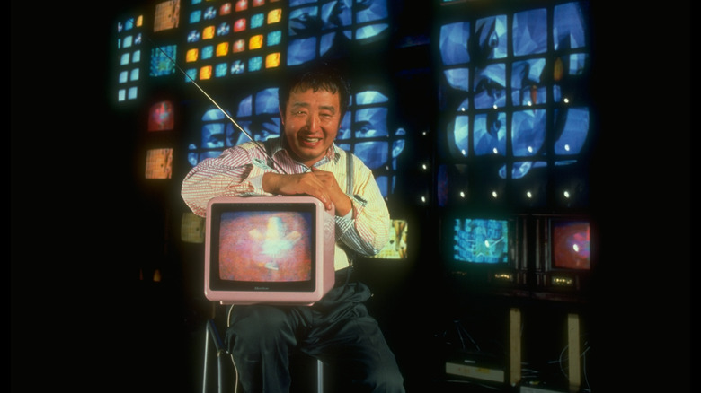 Nam June Paik with video screen installation