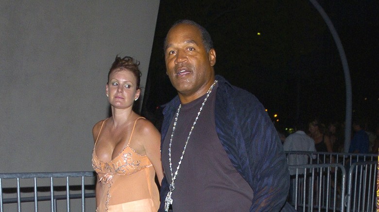 Oj Simpson and Christie Prody at event