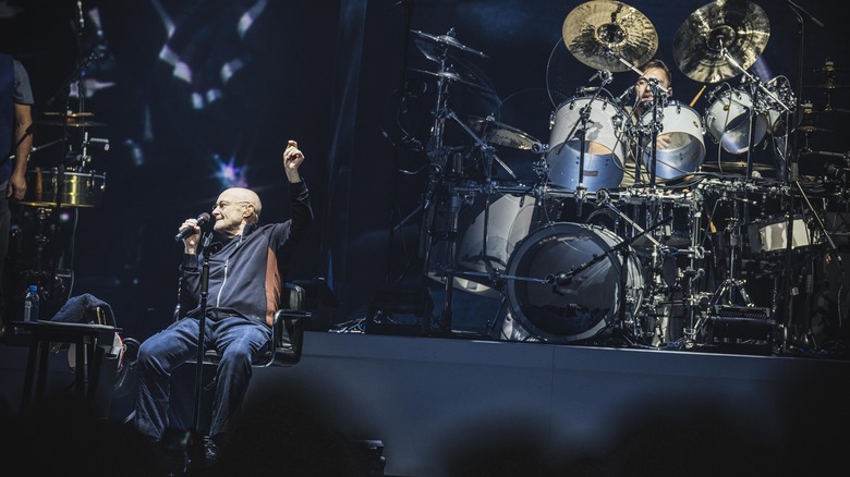Nic Collins on drums with father Phil Collins