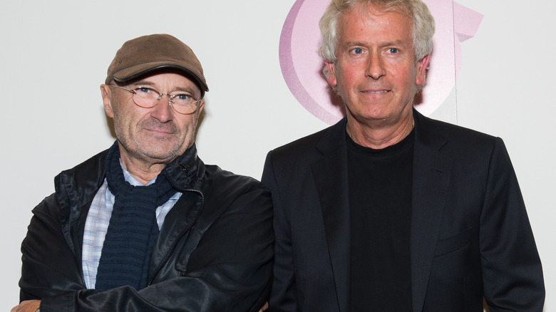 Tony Banks and Phil Collins at an event