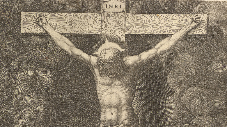engraving of jesus on a cross