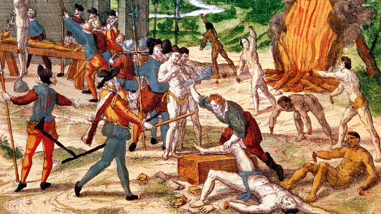 Spanish conquistadors torturing indigenous people