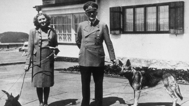 Hitler and Eva Braun with dogs