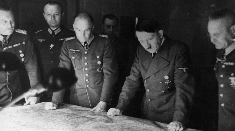 Hitler looking at map