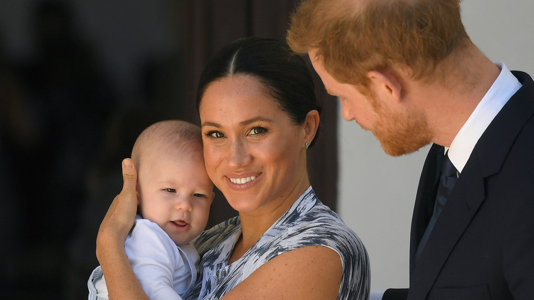 Meghan Markle and Prince Harry pose with son Archie