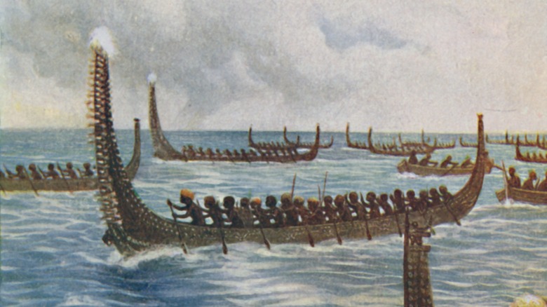 Polynesian war canoes on water