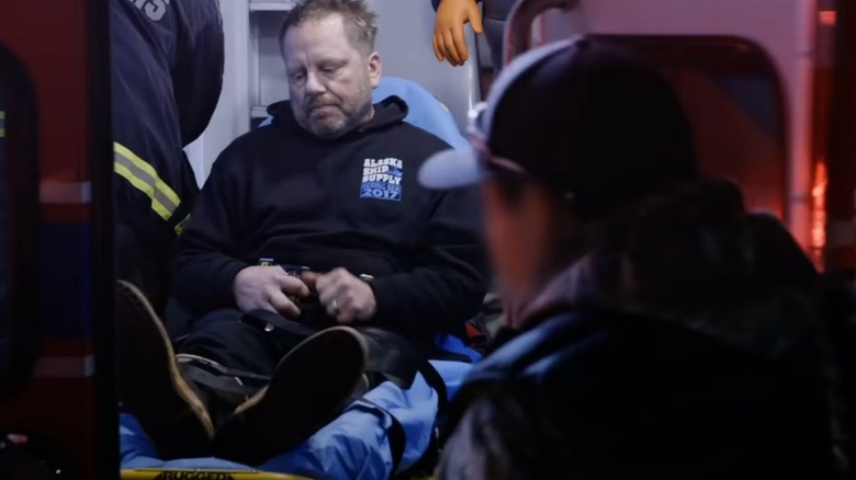Norman Hansen in an ambulance