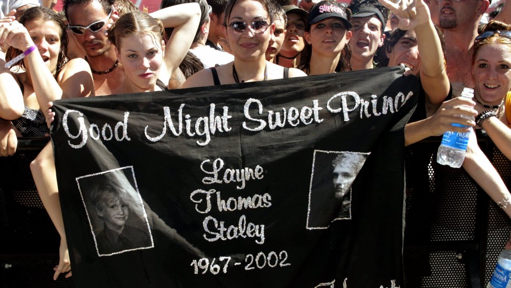Fans holding a memorial banner for Layne Staley in 2002
