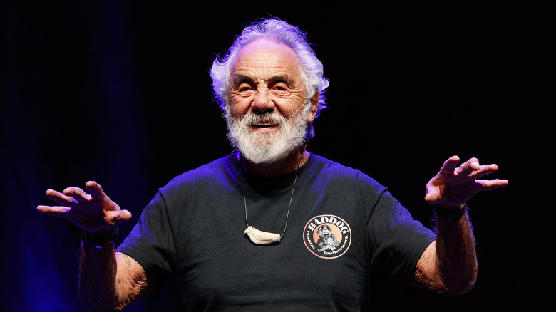 tommy chong hands raised