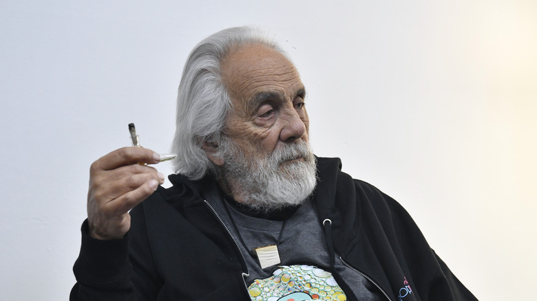 Tommy Chong with a joint