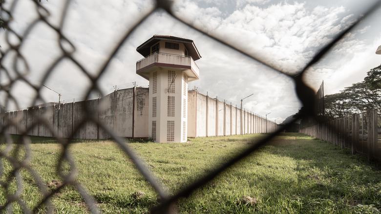Prison behind fence