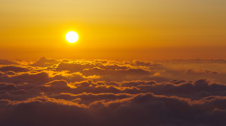 Sunrise over the clouds.