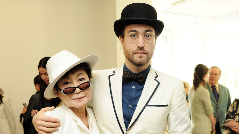 Yoko Ono and Sean Lennon wearing hats