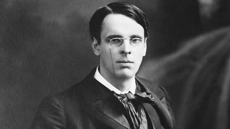 William Butler Yeats wearing glasses