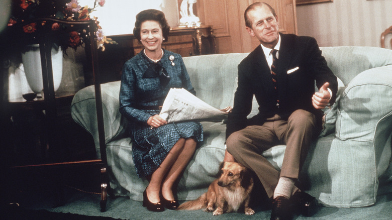 Queen Elizabeth II, Prince Philip and pet corgi dog