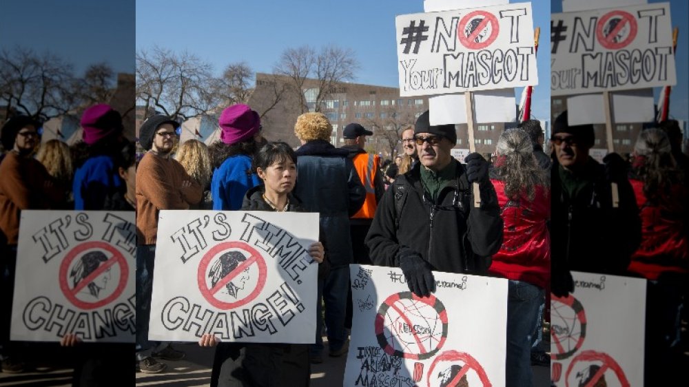 Protesters rally to change the name of the Washington Redskins in Minneapolis, MN in 2014