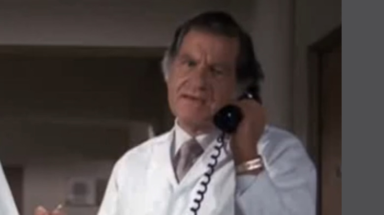 Doc Bergman uses phone in "Hawaii Five-O"