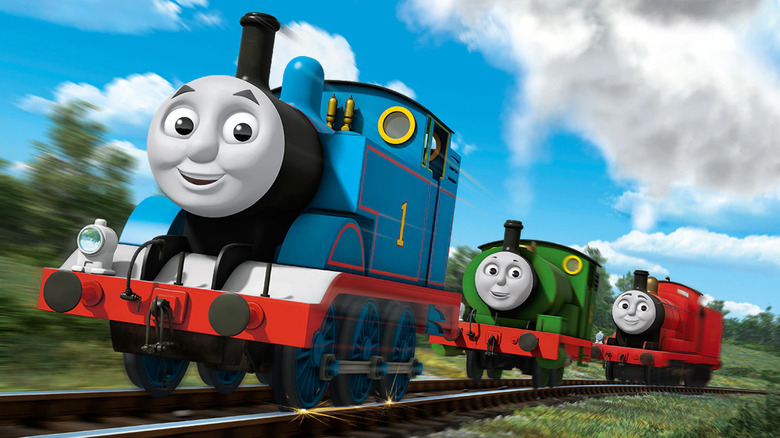 Thomas, Percy, and James riding train tracks