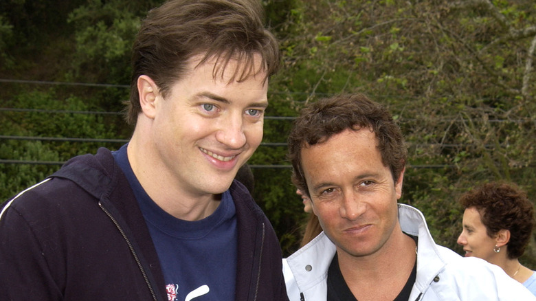 Brendan Fraser and Pauly Shore grinning