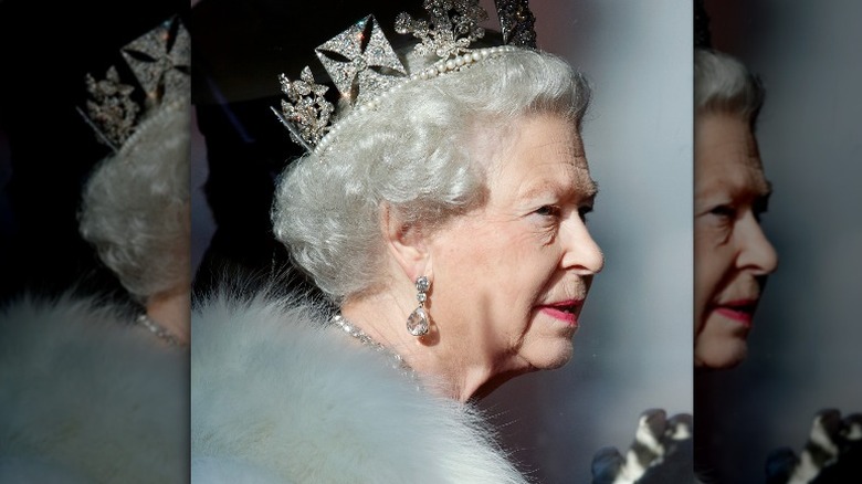 Queen Elizabeth II wears a crown